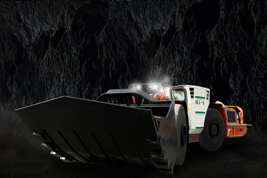 Yellow underground mining loader in a mine